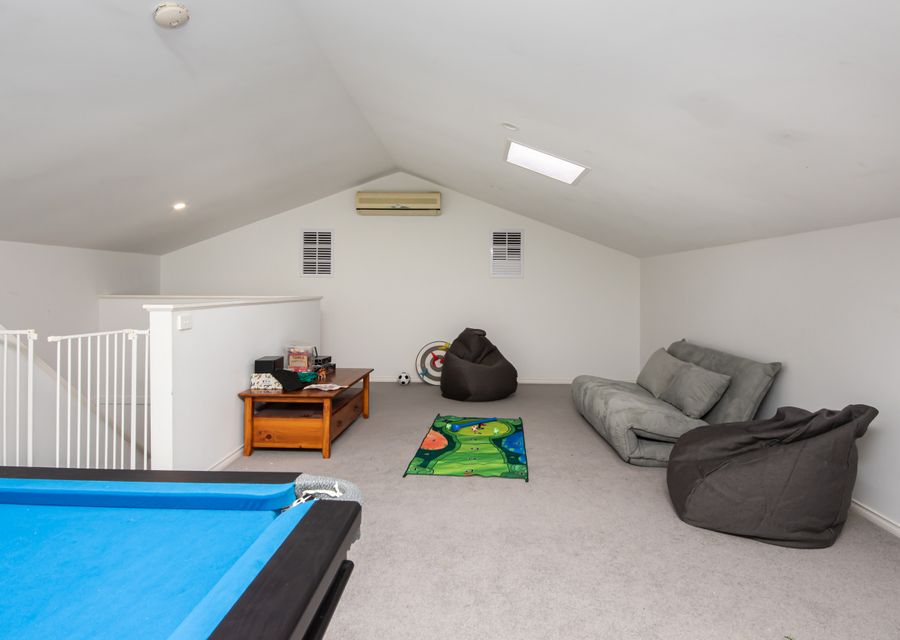 Third living area with pool table and games room 