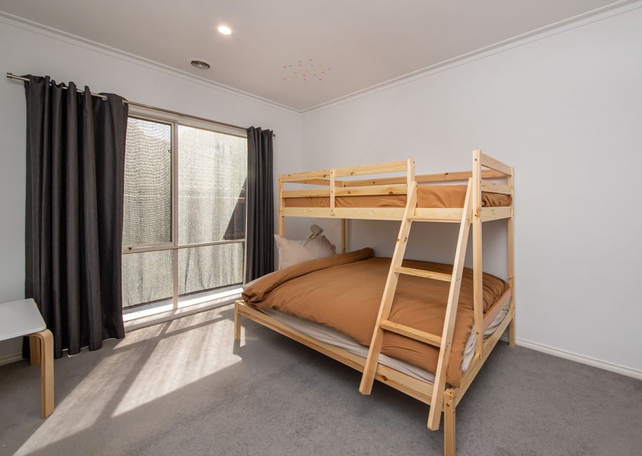 Bedroom five with double bunk with single above 