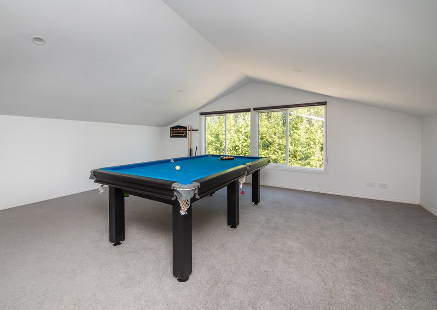 Third living, games room with pool table 