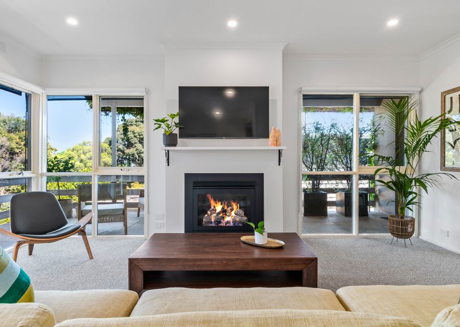 Living room with views and gas fireplace 