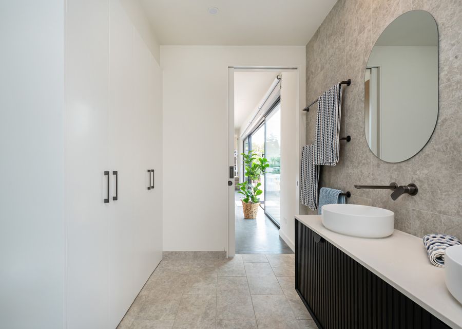 Bathroom with European laundry