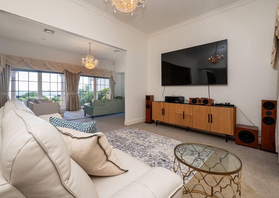 Fourth living area with large screen TV for movie nights