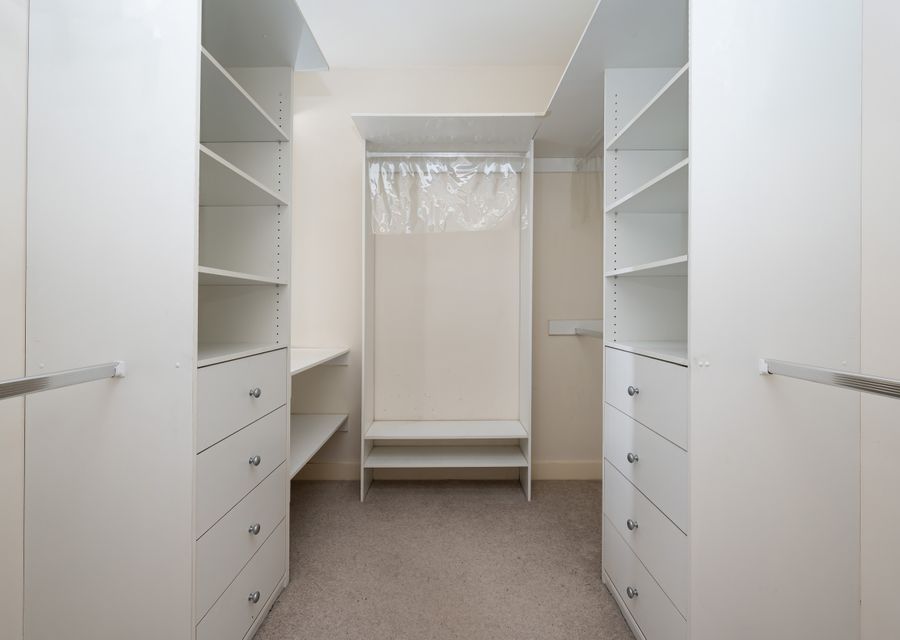 Spacious master bedroom walk in robe