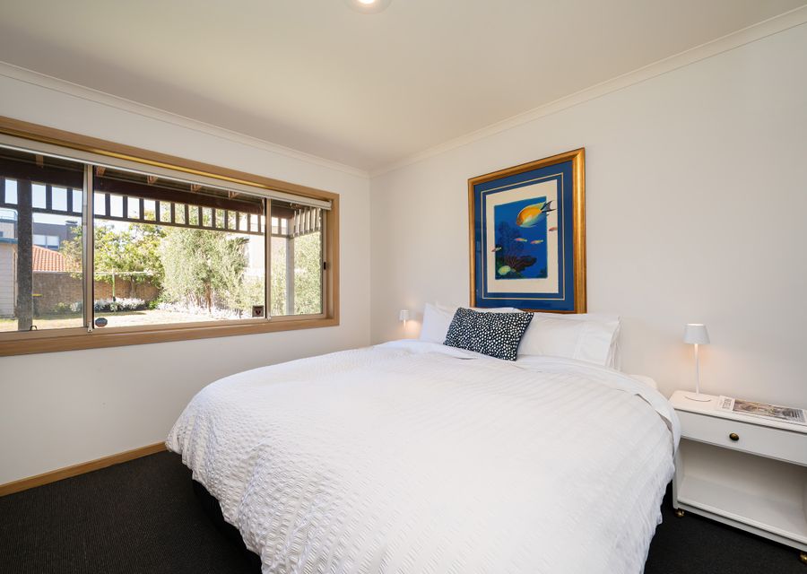 Bedroom three downstairs with king bed 