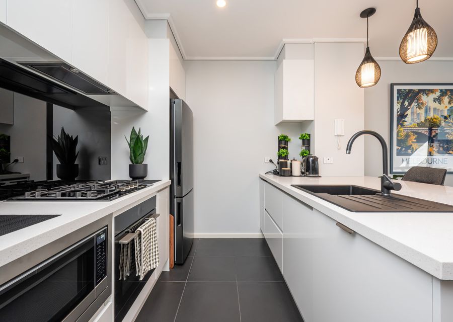Sleek, modern equipped stocked kitchen