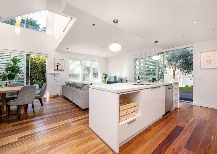 Open plan kitchen, living and dining space with loads of natural light