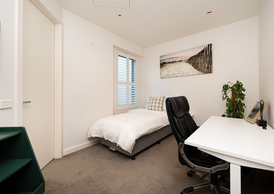 Bedroom 2 with single bed and dedicated study / work space