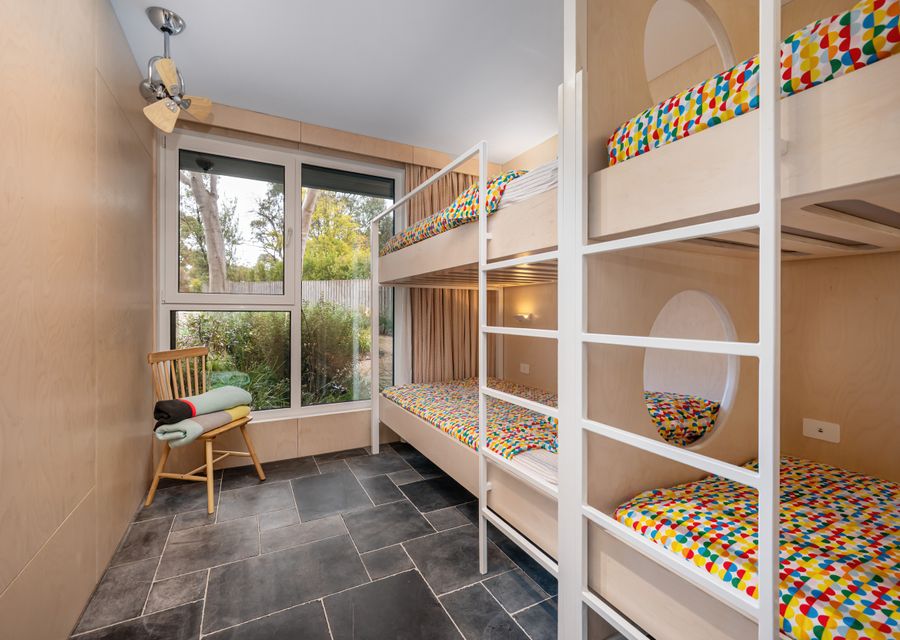 Bunk room downstairs with king single bunks 