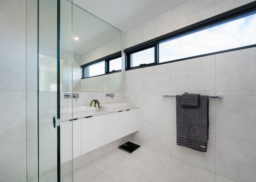 Family bathroom with walk shower and double vanity