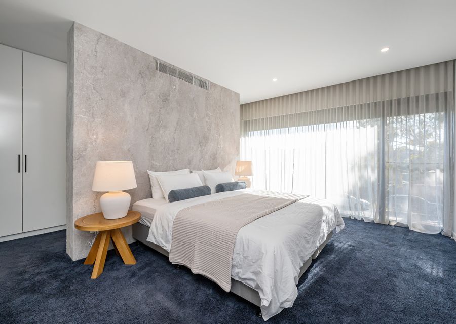 Large spacious master bedroom with king bed