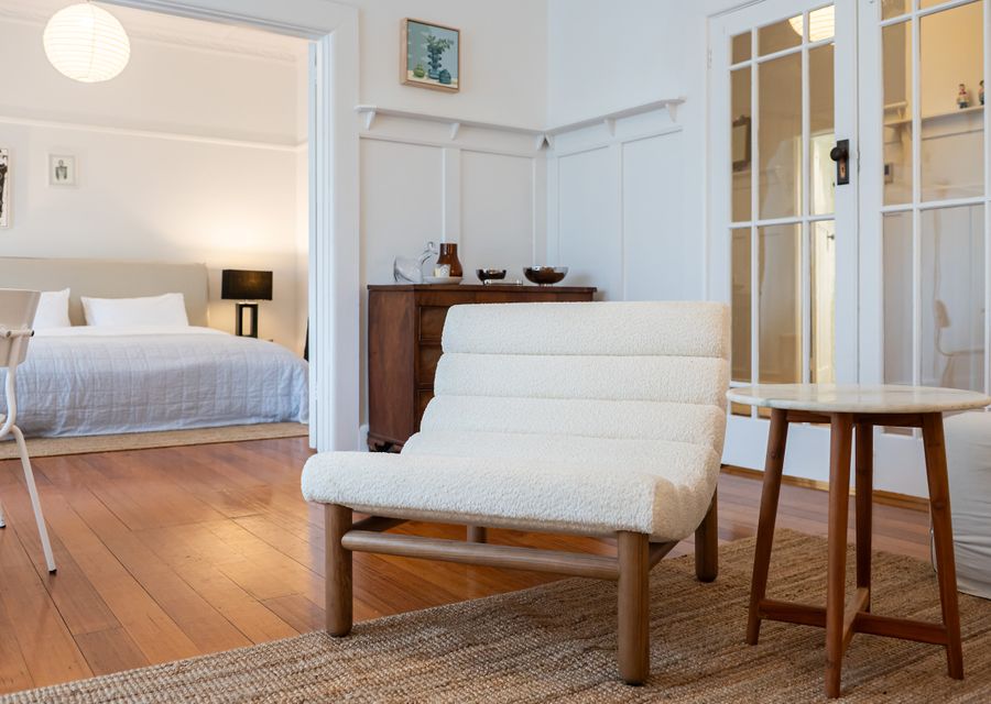 Bedroom 1 leads off the living dining room with large double doors and blinds for privacy