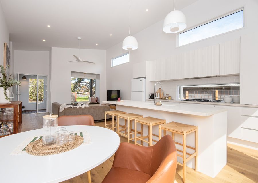 Modern light and bright living space with smart tv and fully equipped kitchen 
