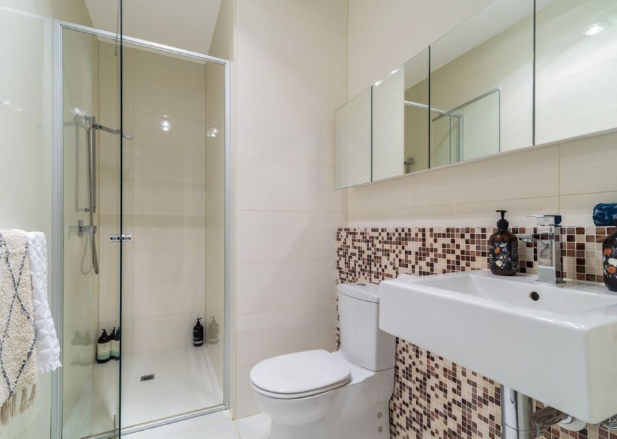 Master Ensuite with shower, single vanity and toilet