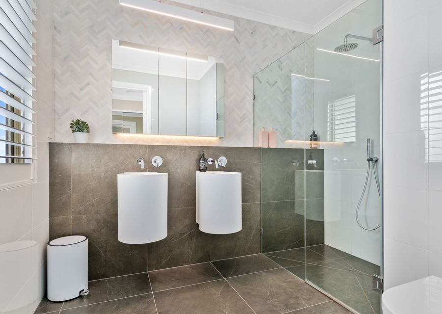 Master ensuite with walk in shower, double sink and toilet