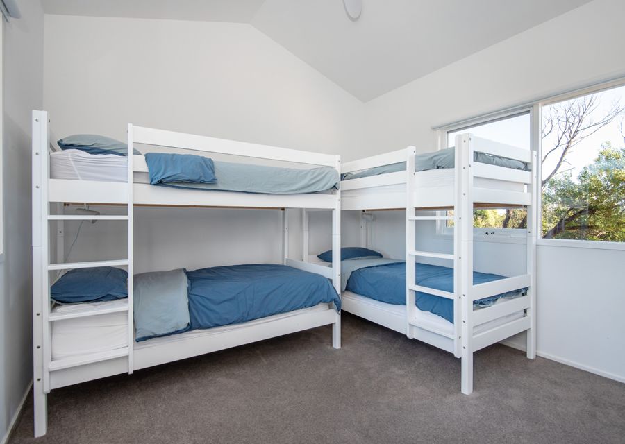 Downstairs bedroom with two single bunks 