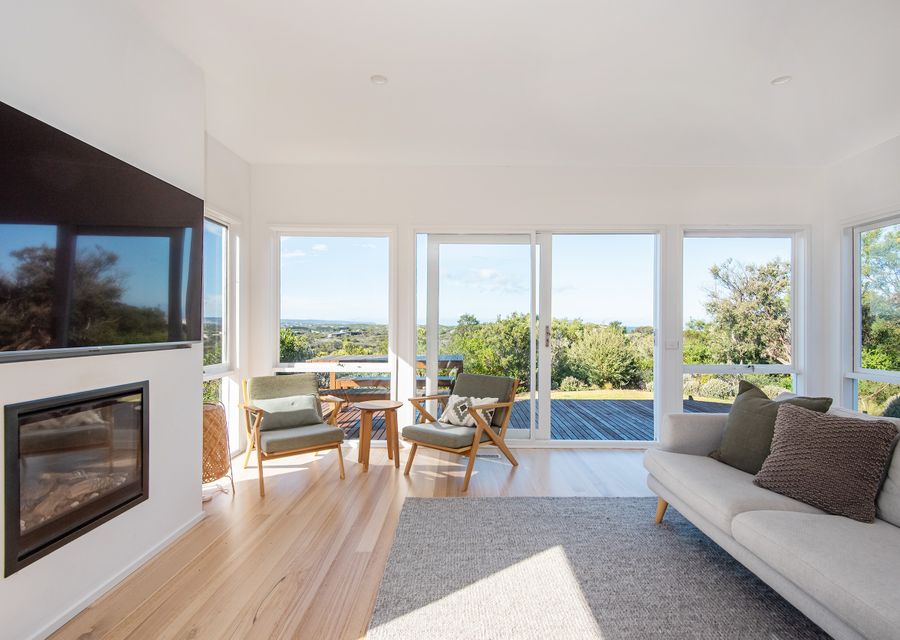 Main living with smart Tv and gas fireplace 