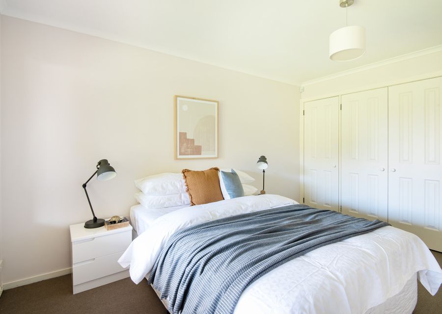 Downstaitrs bedroom with queen bed 