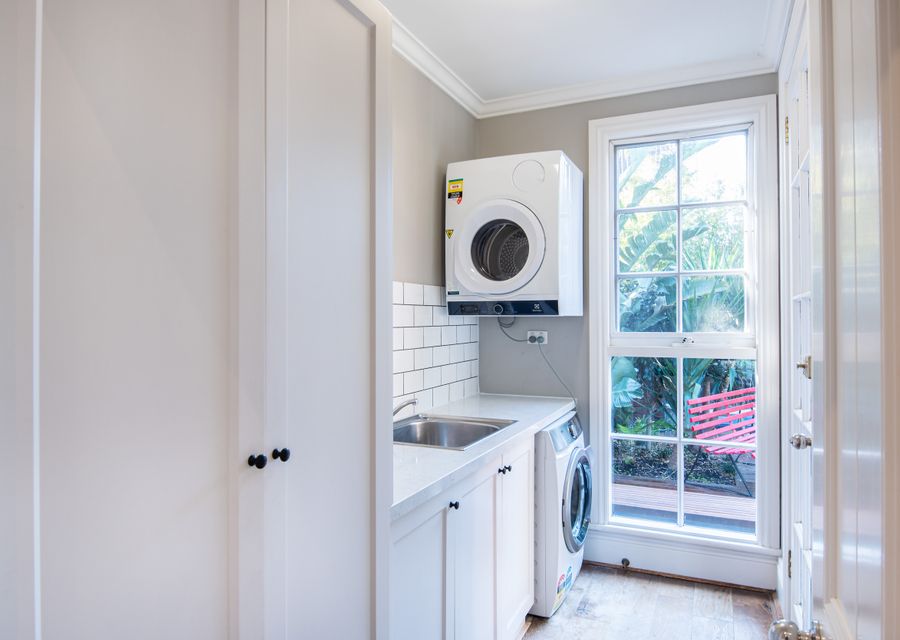 Spacious laundry with washing machine and dryer